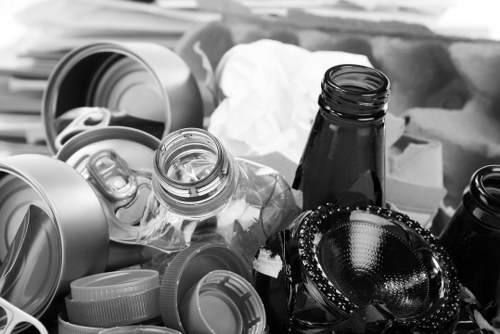 Team sorting household items during a house clearance in Acton for recycling and donation